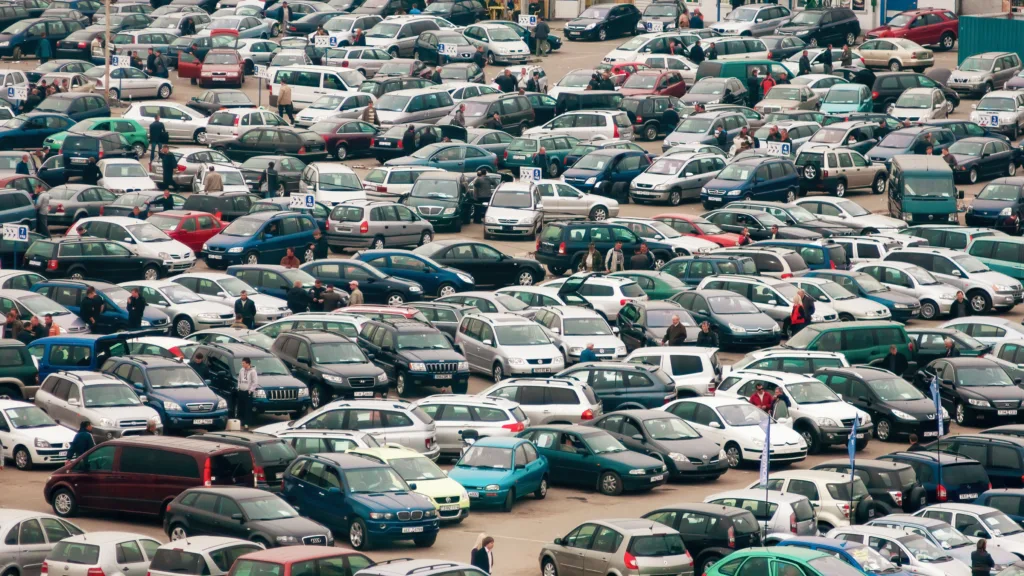 Minsk, Belarus - April 23, 2011: Automobile market. A lot of used cars are lined up in rows