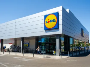 Badajoz, Spain. July 3, 2024. Front entrance facade of a Lidl supermarket in the city of Badajoz.