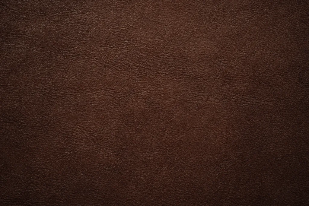 brown leather texture, skin surface as dark background