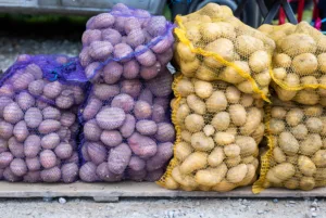 Potato packed in mesh bag at grocery