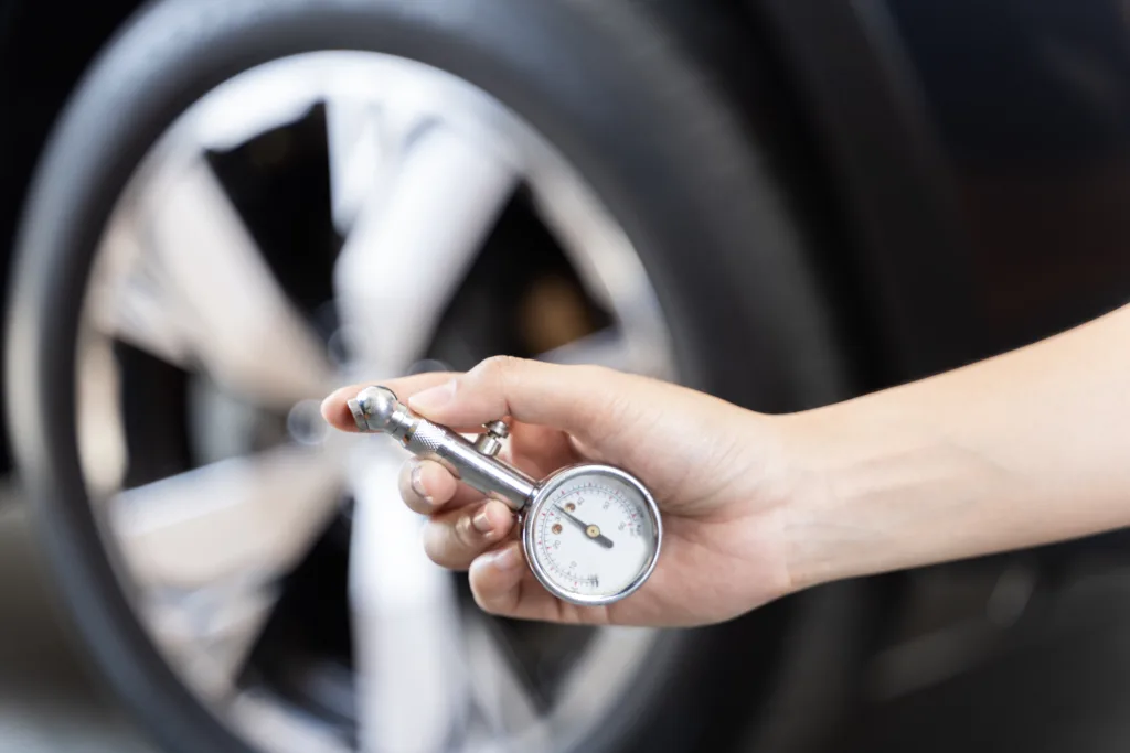 The tire pressure gauge is a tool used to measure the air pressure in a tire. The correct tire pressure is important for safety and fuel efficiency. Checking the tire pressure to make sure.